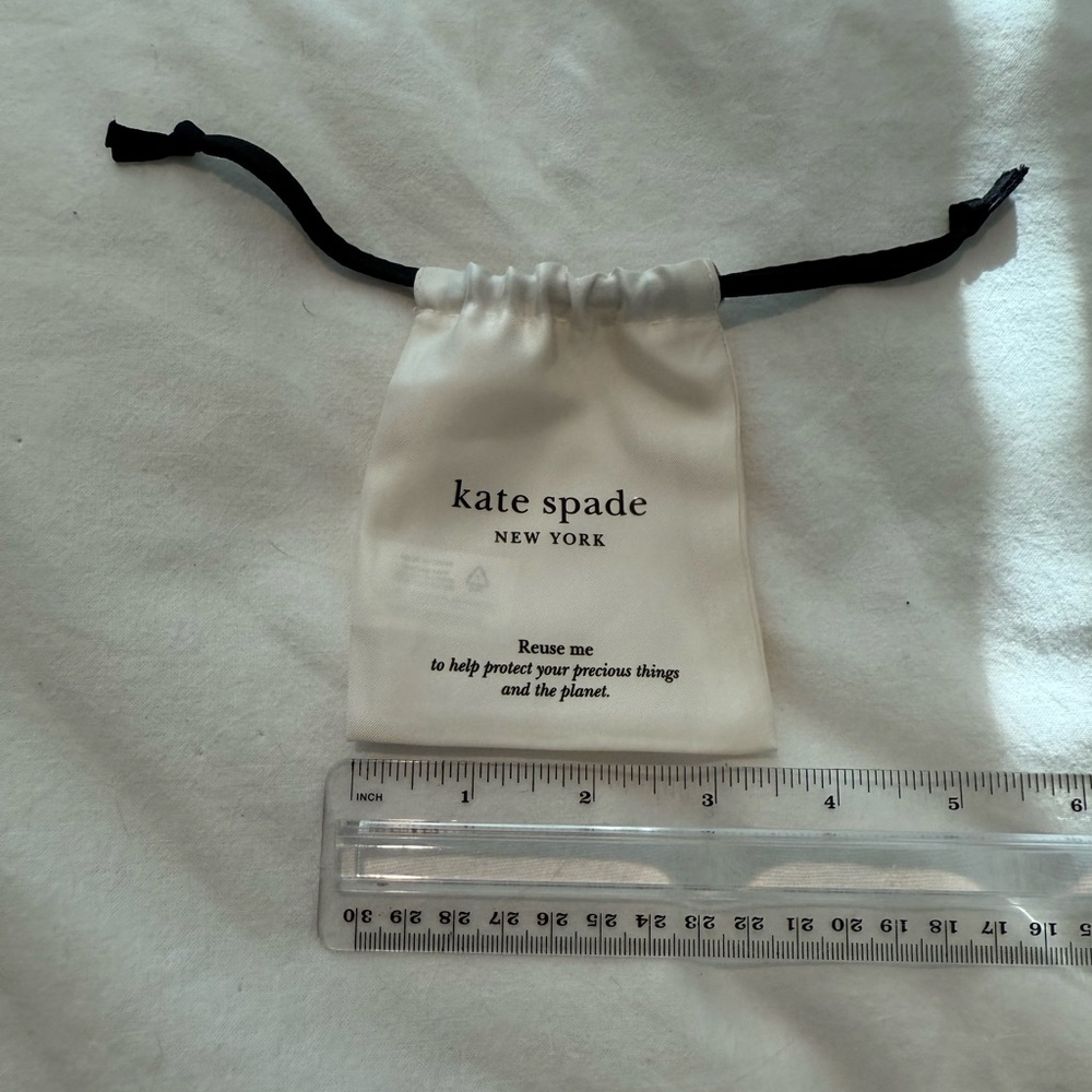 Kate Spade Cream Drawstring Pouch